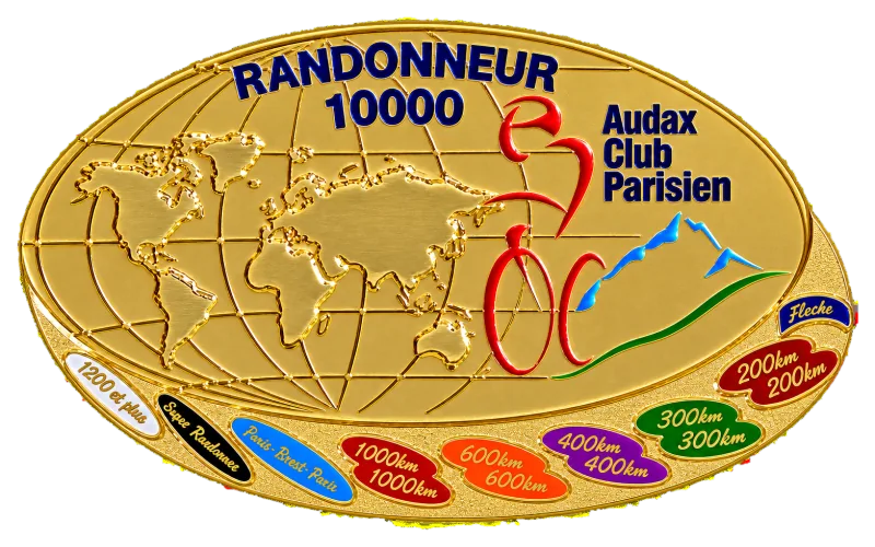 The ACP Randonneur 10000 medal, a gold oval with the world map and two of each distance along its rim
