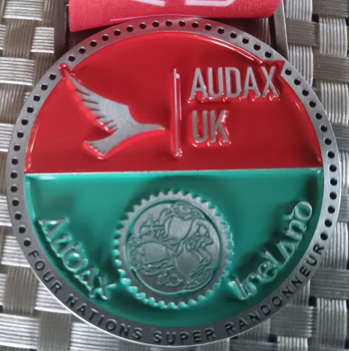 The Four Nations Super Randonneur medal, with the Audax UK and Audax Ireland emblems